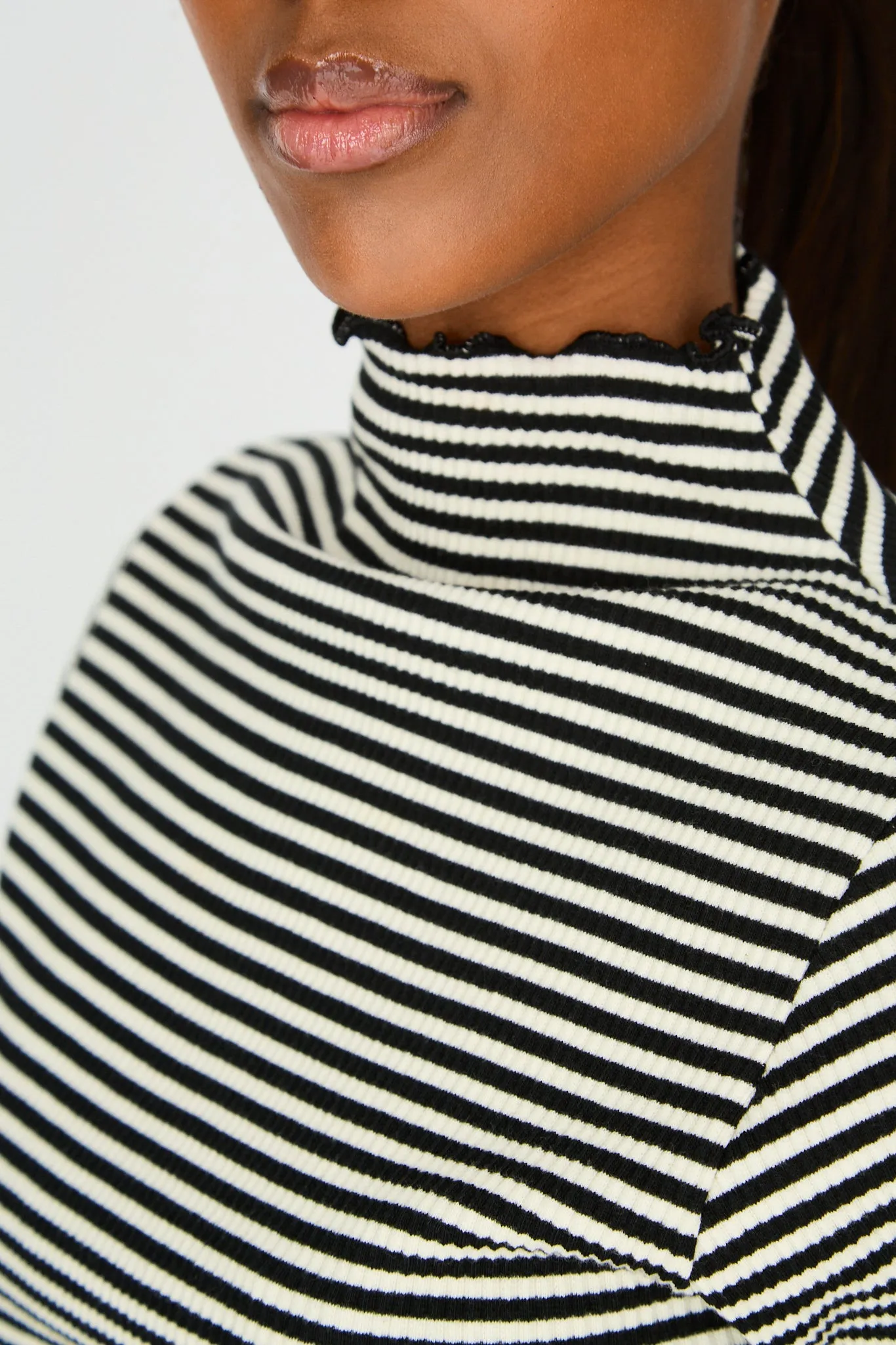 Black and white horizontal stripe ruffle trim turtleneck